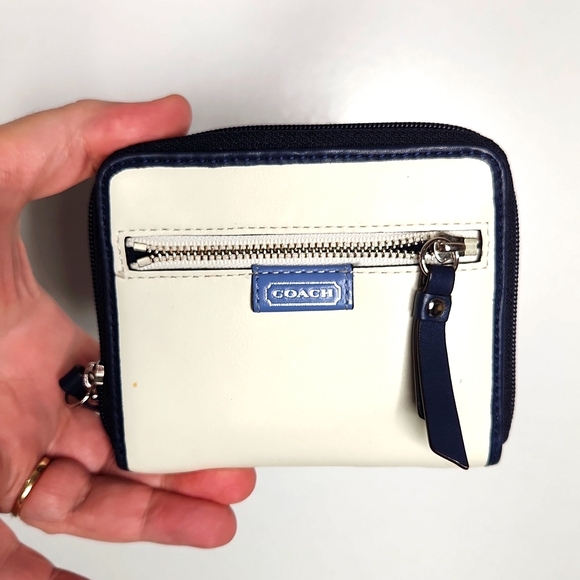 Coach Handbags - Coach cream and Navy mini wallet. Pre loved item sold as is